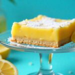 Close-up of a delicious lemon bar with a creamy lemon filling and a buttery crust.